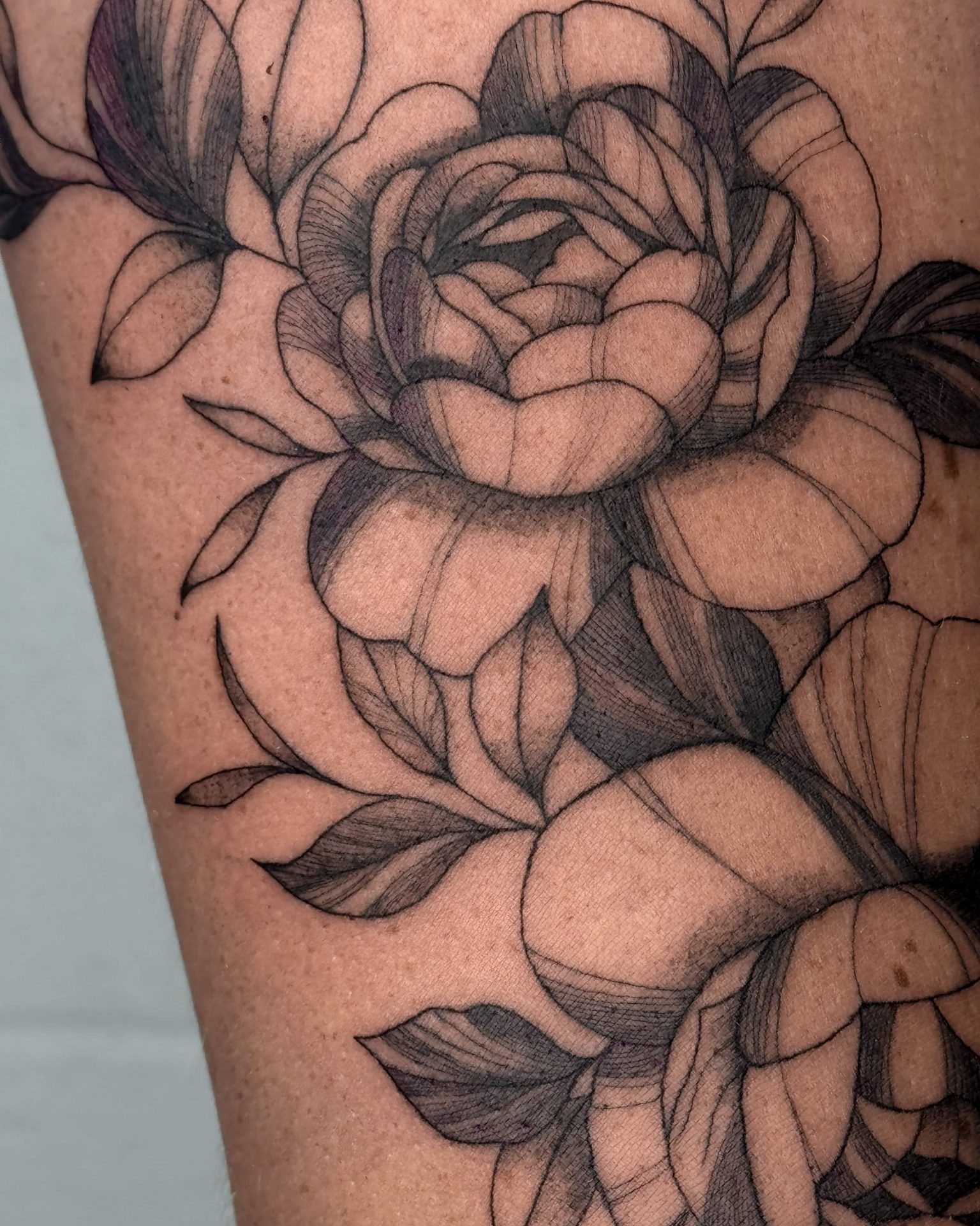 tatouage fleur femme